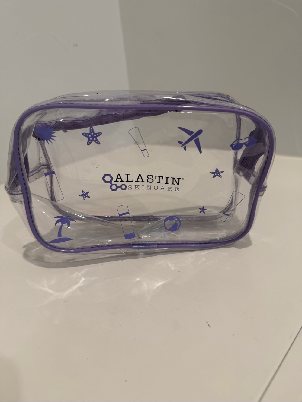 Alastin Skincare Clear Travel Cosmetic Bag - Purple Trim